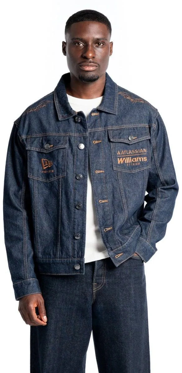 A man wearing a dark blue New Era 2026 Williams F1 Racing Team Austin GP COTA Denim Indigo Jean Jacket with embroidered  &