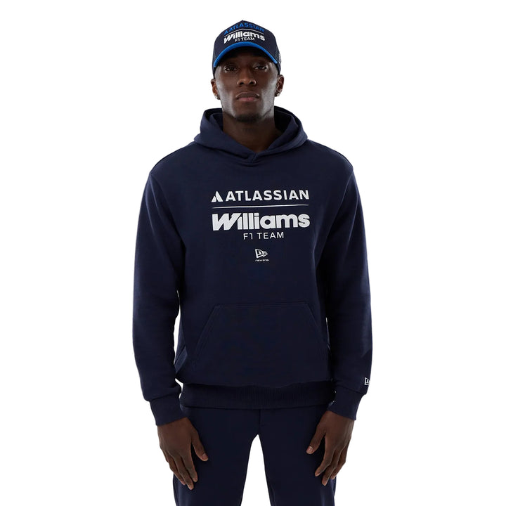 A Williams F1 Team F1  fan wearing a navy hoodie with &