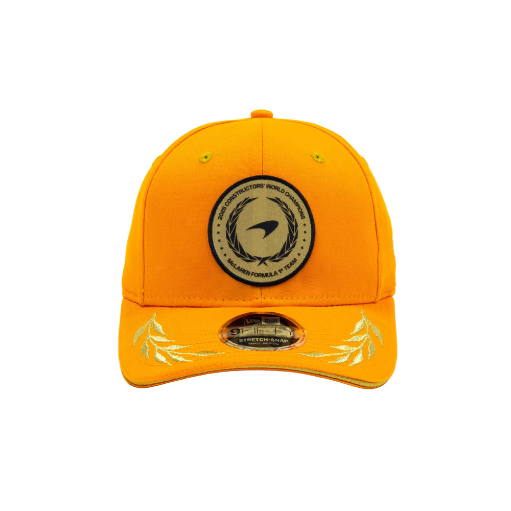 Papaya orange McLaren 2025 F1 Champions limited edition baseball cap, detailed with embroidered championship laurels on the front and visor with a structured crown with large circular gold patch to the front designed by New Era.