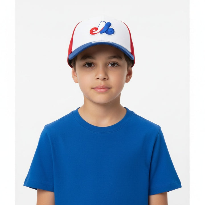 6 to 12 years old boy child wearing an official Montreal Expos New Era blue, red, and white cap with a logo on a white background