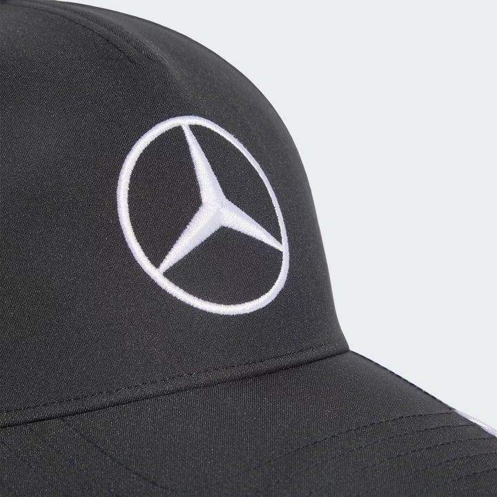 Close-up of a black baseball cap featuring a white embroidered 2026 Imola GP Italian Grand Prix Monza Mercedes-Benz three-pointed star logo on the front panel, set against a light gray background.