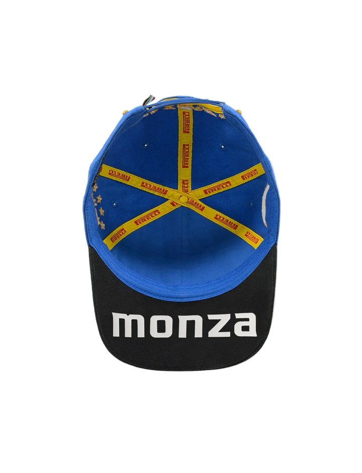 A structured 2026 Pirelli Podium Formula 1 baseball cap shown from the back, featuring a royal blue crown with yellow cross-brace details printed with &