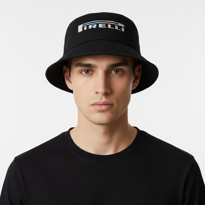 F1 male fan wearing a black bucket hat with Pirelli logo on a white background