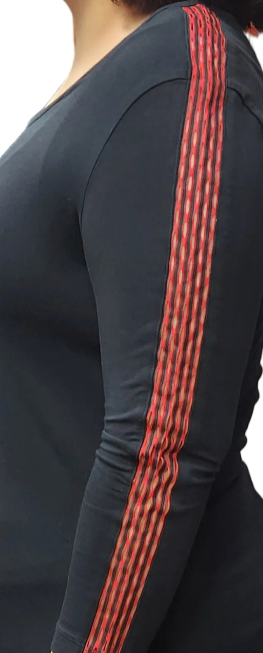 Ferrari women’s black F1 team t-shirt with minimalist black monochrome sleeve and red slits details with tailored silhouette