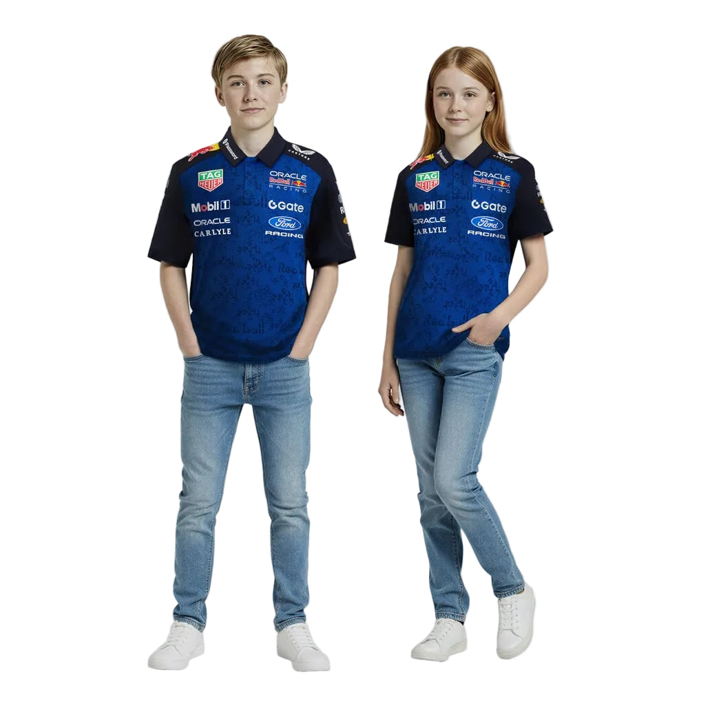Two children wearing matching blue and Night Sky Oracle Red Bull Racing 2026 F1 Team Set Up Polo shirts with various logos on a white background