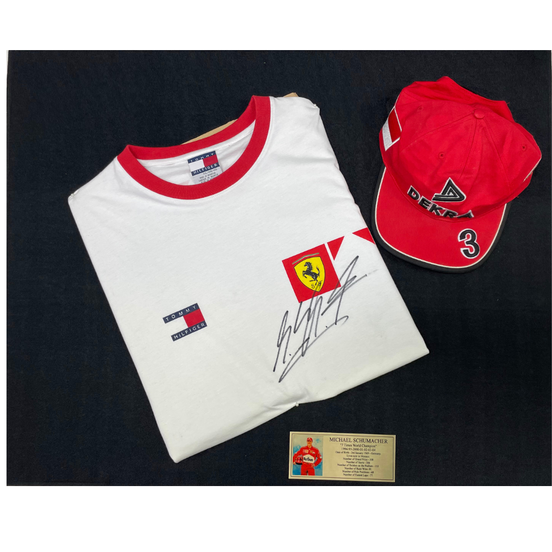 Michael Schumacher Signed Driver T-Shirt and Scuderia Ferrari F1 Team Dekra Baseball Cap